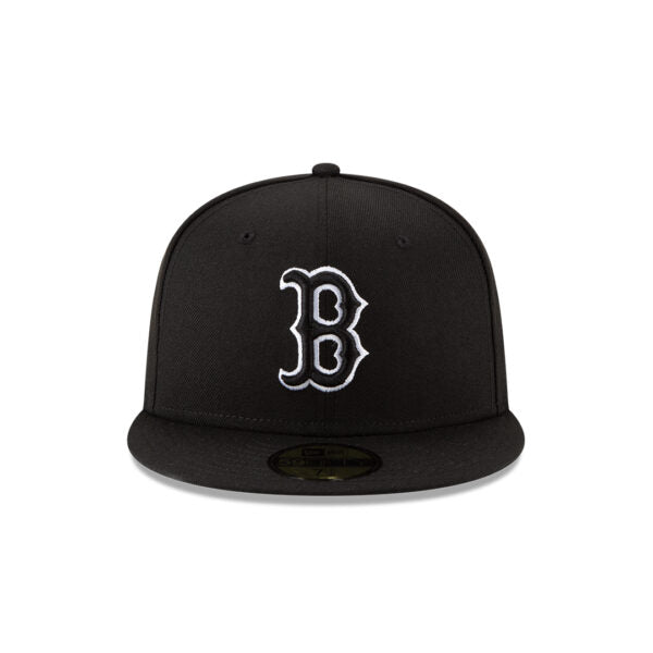 Black baseball cap with white logo on a white background